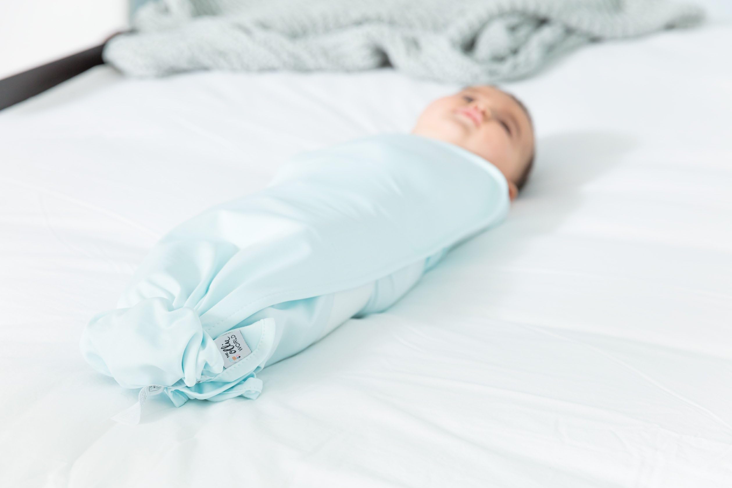 The Ollie Swaddle - Helps to Reduce The Moro (Startle) Reflex - Made from a Custom Designed Moisture-Wicking Material (Sky)