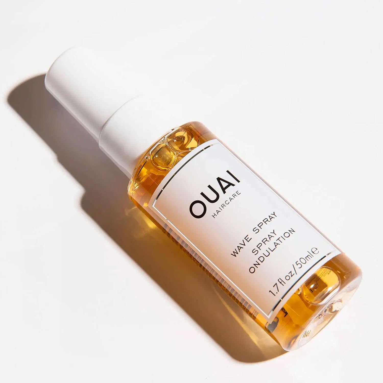 OUAI Wave Spray - Coconut Oil & Rice Protein Texture Mist for Voluminous Beach Waves with Shine - Paraben Free, Safe for Color & Keratin-Treated Hair (4.9 fl oz)