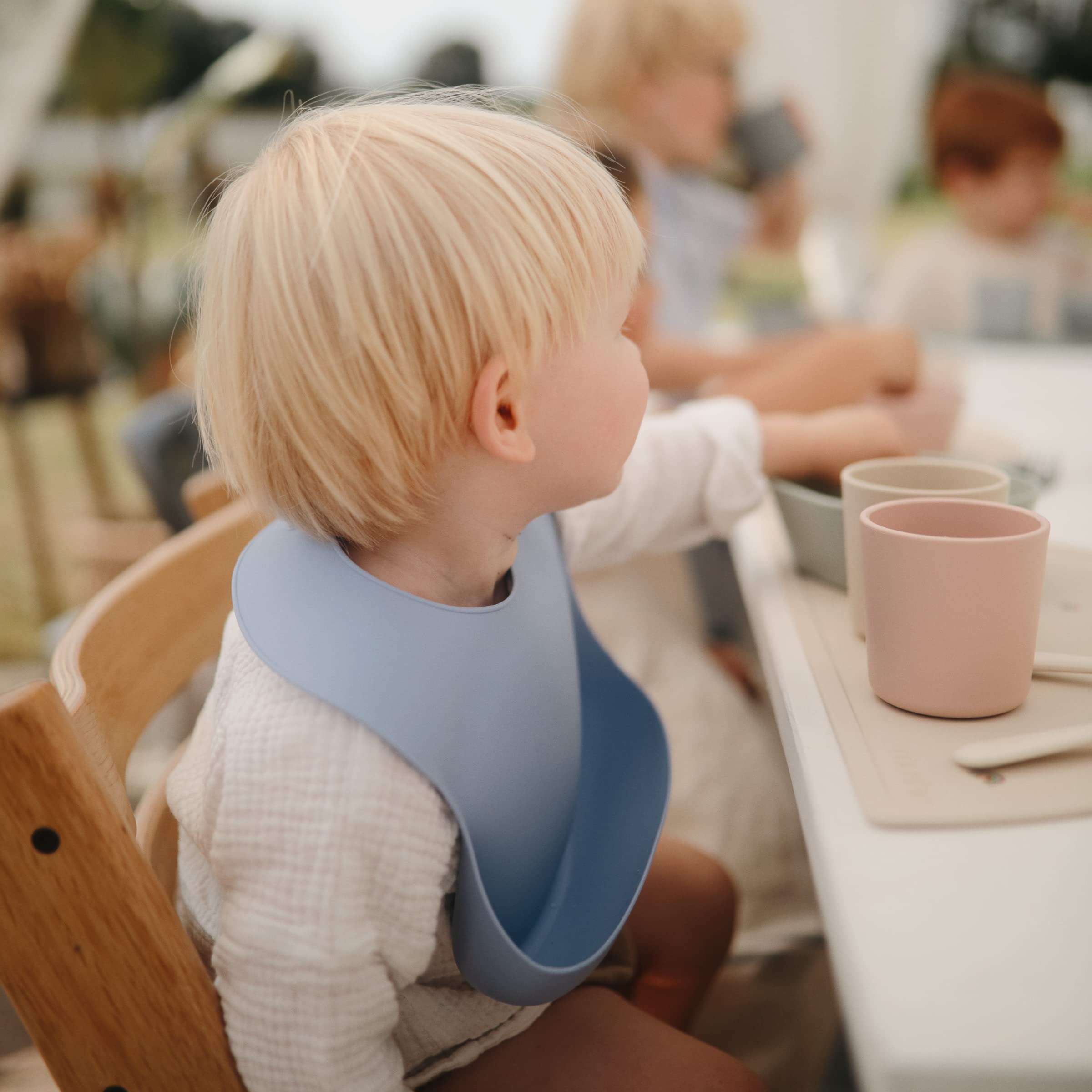 mushie Silicone Baby Bib | Adjustable Fit Waterproof Bibs (Whales)