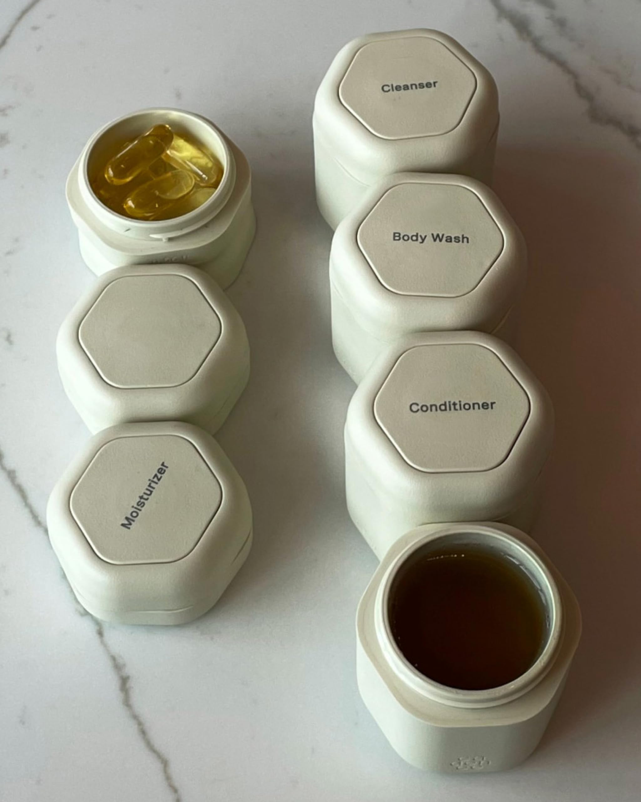Cadence Travel Containers - Daily Routine Capsule Set - Magnetic Travel Capsules - For Shampoo, Conditioner, Body Wash, Pills, and More - 4 Flex Mediums (1.32oz) & 3 Flex Smalls (0.56oz) - Sand