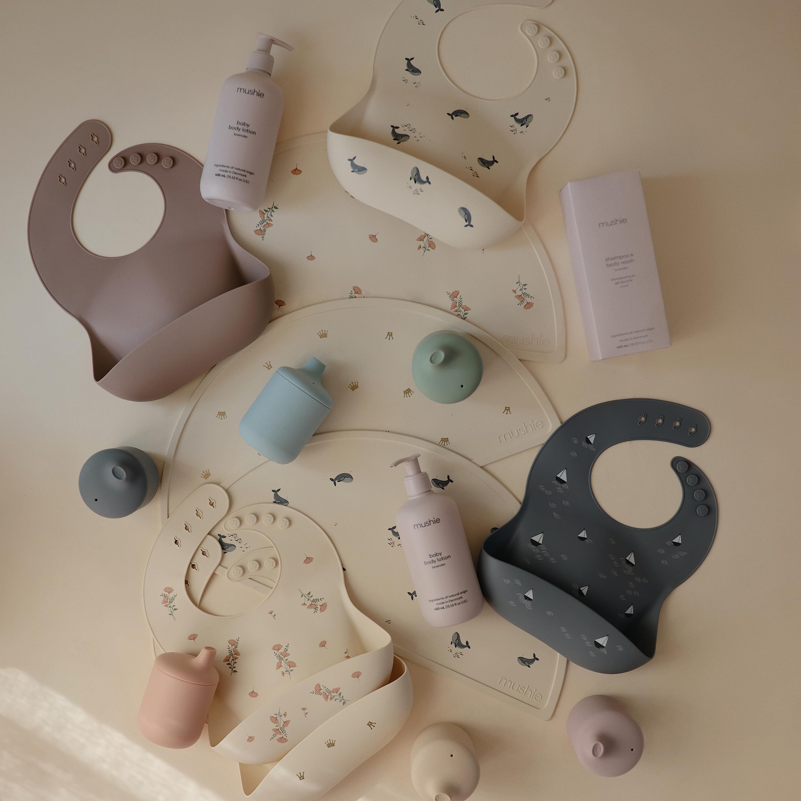 mushie Silicone Baby Bib | Adjustable Fit Waterproof Bibs (Whales)