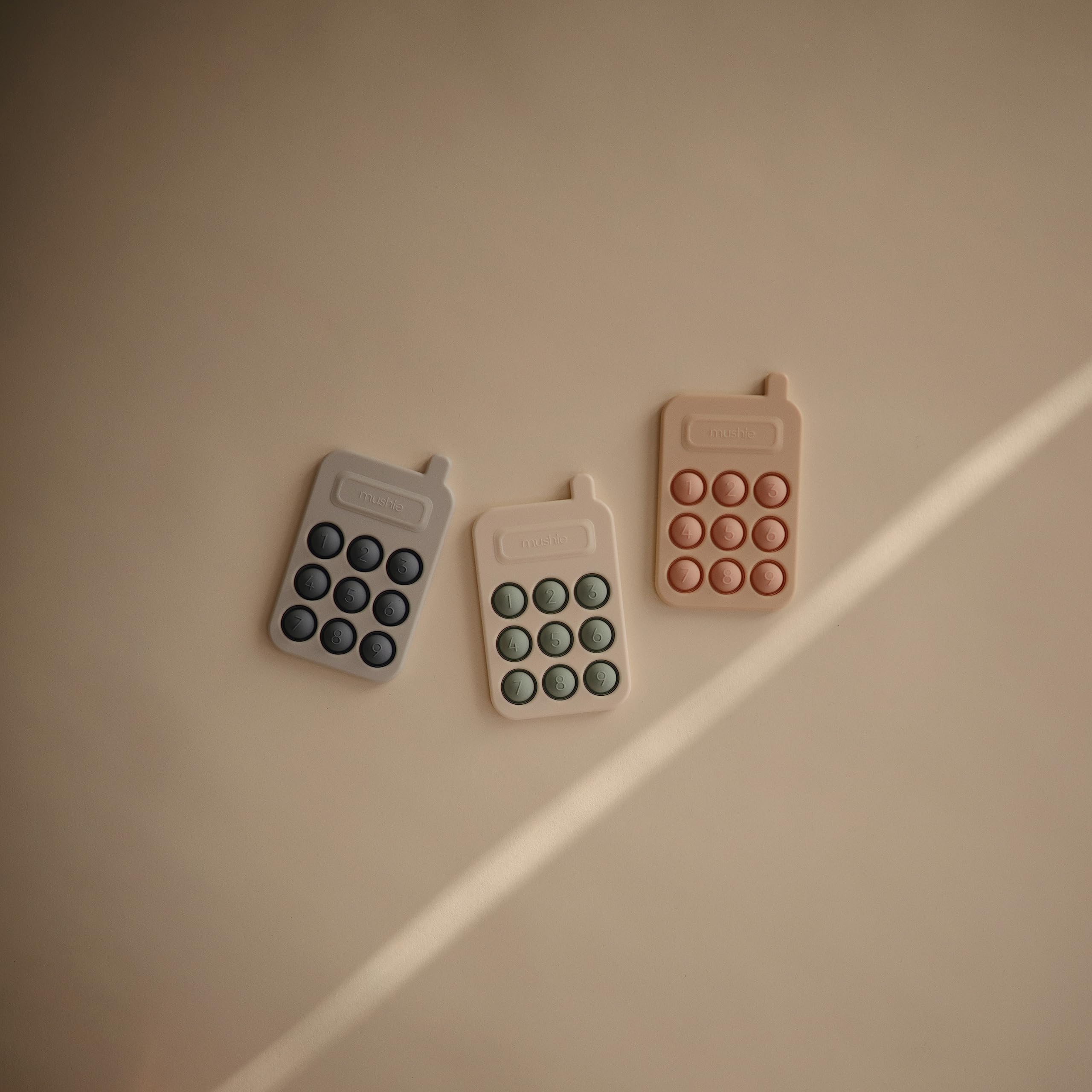 mushie Paint Palette Press Toy