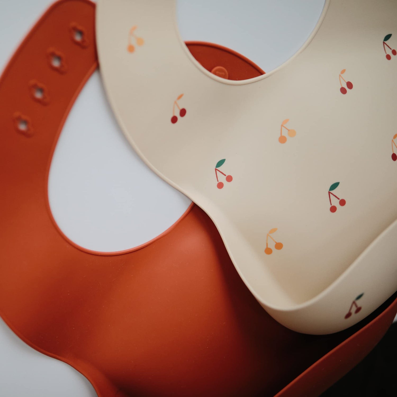 mushie Silicone Baby Bib | Adjustable Fit Waterproof Bibs (Whales)