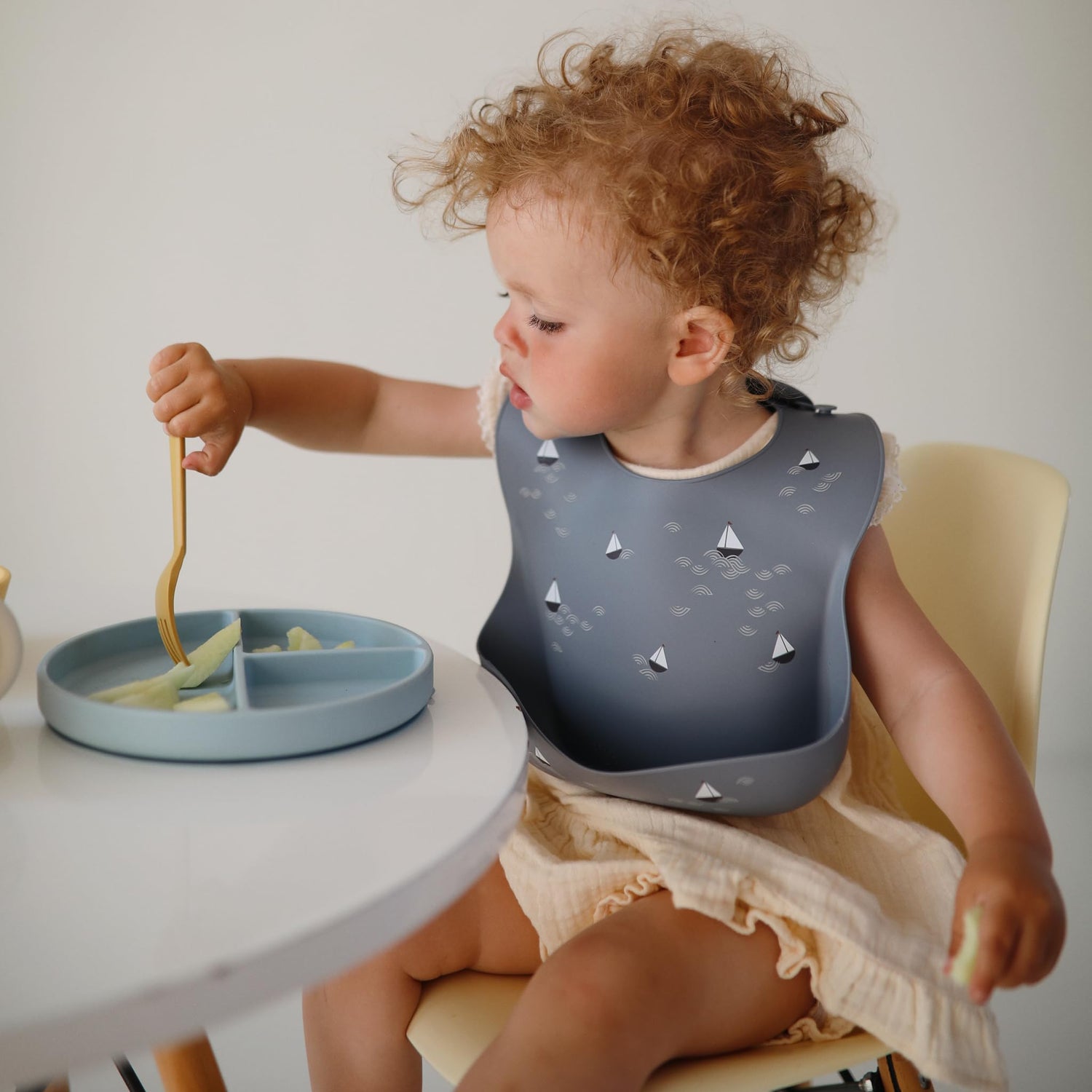 mushie Silicone Baby Bib | Adjustable Fit Waterproof Bibs (Whales)
