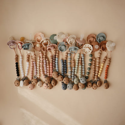 mushie 100% Silicone Baby Pacifier Clip BPA Free | Luna (Faux Wood)