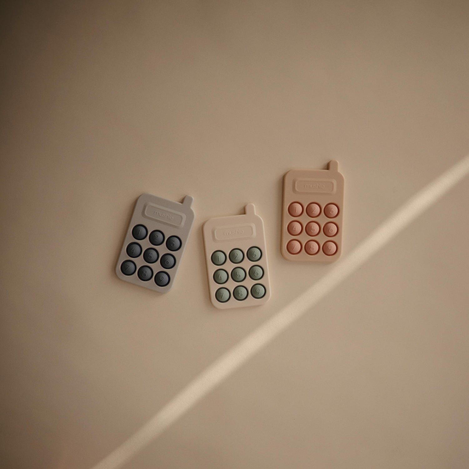 mushie Paint Palette Press Toy